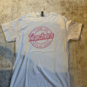 Gildan White tshirt
With Barbie style writing COME ON TEACHERS LETS GO TEACH